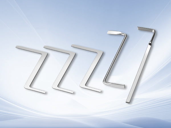 Five metal tension tools displayed against a light blue background